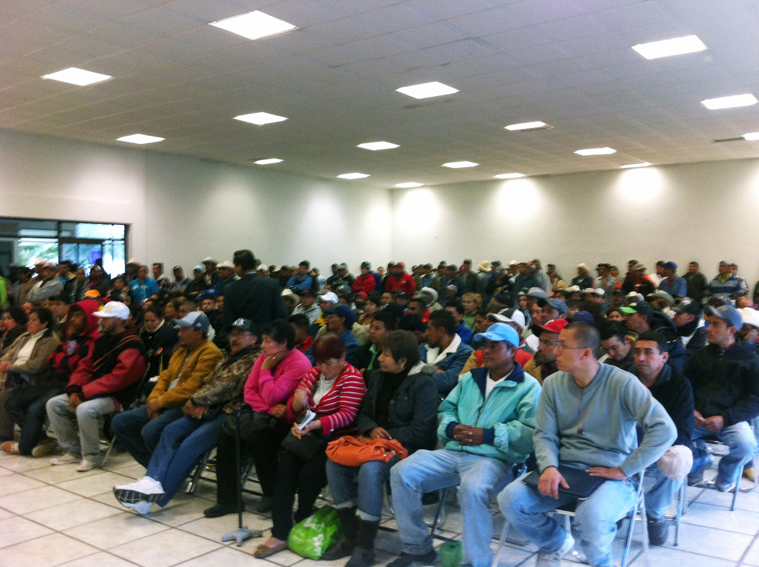 Participants listen to an educational workshop in San Luis Potosi
